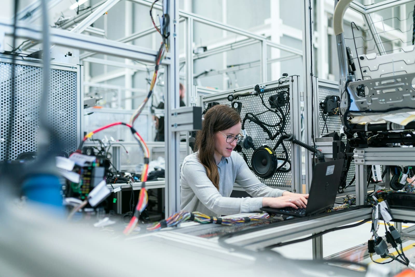 Business professional using a laptop for AI adoption planning and automation